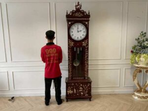 Floor clock decorated with pearls