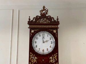 Floor clock decorated with pearls
