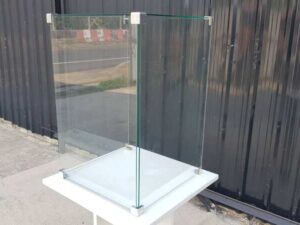 White wooden display case with glass doors.