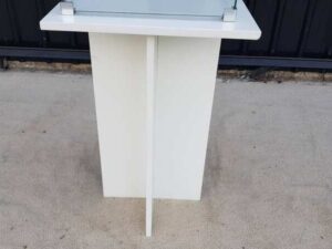 White wooden display case with glass doors.