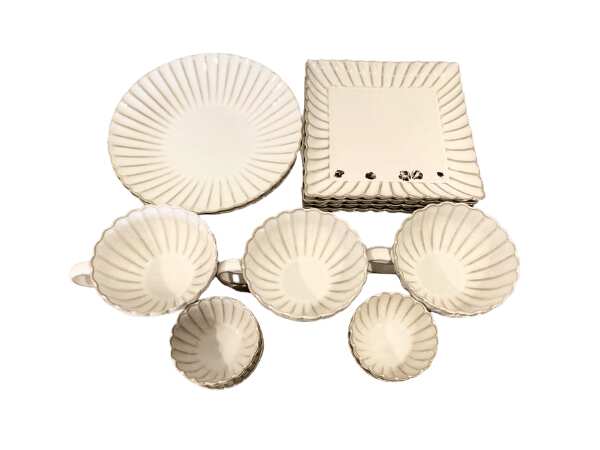 Set of white ceramic containers with striped pattern