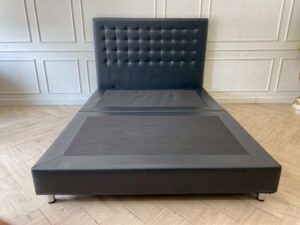 5-foot leather bed frame with button tufting, black color. Includes a 5-foot HLS DAISY mattress, 9 inches thick.