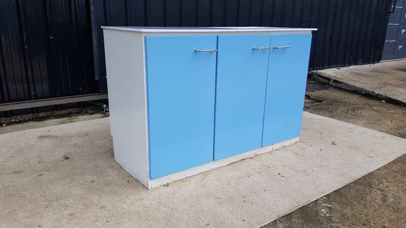 Blue washbasin with three doors