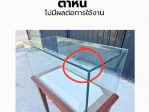 Glass display case with wooden legs and 1 sliding track. Wood color.