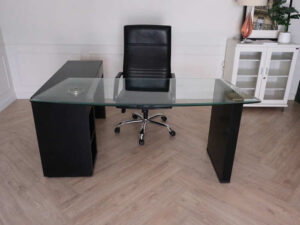 L-Shape corner work desk, glass top, modern black color, foldable adjustable table. Has drawers and storage compartments._38XUB9LPX7