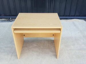 Brown wooden computer desk, MOFLEX brand.