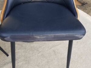 Dining chair, steel legs, black leather seat with button closure