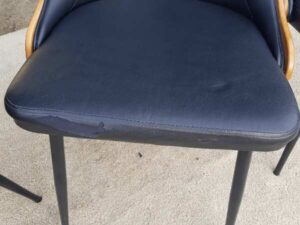 Dining chair, steel legs, black leather seat with button closure