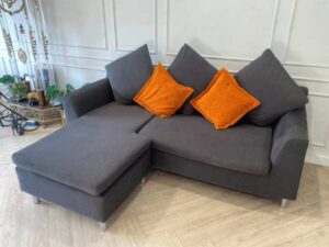 L-shaped corner sofa, 2 seats, fabric cushion, grey, with pillows