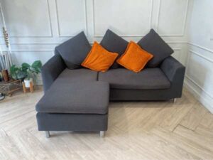 L-shaped corner sofa, 2 seats, fabric cushion, grey, with pillows
