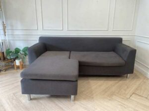 L-shaped corner sofa, 2 seats, fabric cushion, grey, with pillows