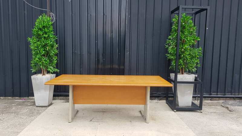 8-seat conference table with steel legs and brown wood top