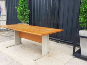 8-seat conference table with steel legs and brown wood top