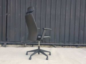 Office chair, executive chair, plastic base, leather seat, backrest with headrest, black.