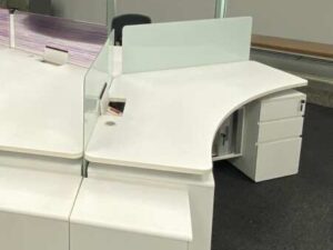 Group workstations + power strip with partitions