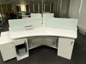Group workstations + power strip with partitions