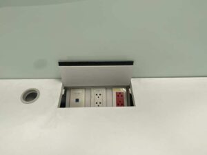 Group workstations + power strip with partitions