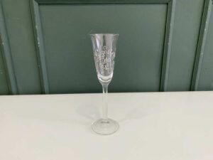 Fruit-shaped champagne glass with a vine pattern around the rim, from the Source Perrier Collection, Nesting model.