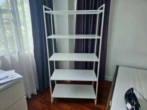 White metal shelving unit, IKEA JONAXEL model. (1)