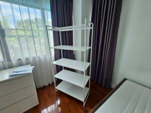 White metal shelving unit, IKEA JONAXEL model. (1)