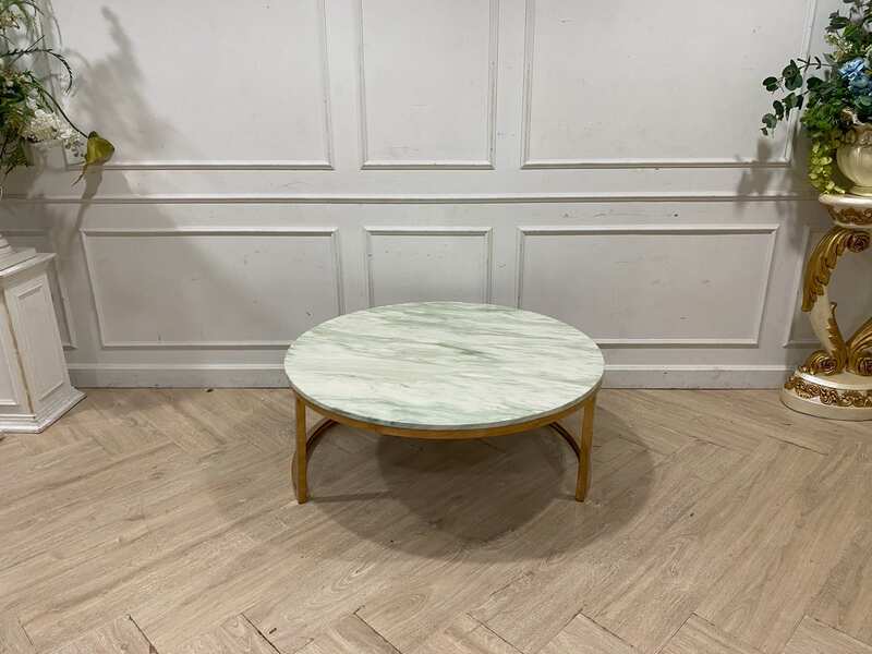 Round table with steel legs and white marble top
