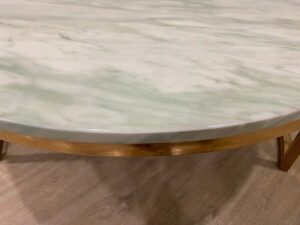 Round table with steel legs and white marble top