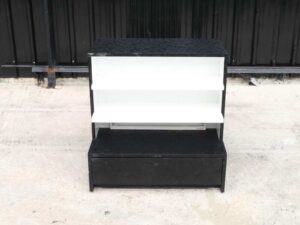 Wooden product shelf, 2 sides, 3 shelves on each side, 1 drawer, black wood frame with triangular pattern._52XAM9MFQT