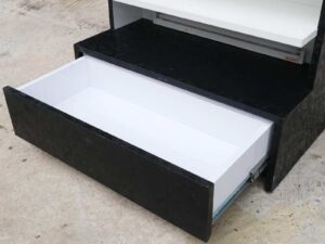 Wooden product shelf, 2 sides, 3 shelves on each side, 1 drawer, black wood frame with triangular pattern._52XAM9MFQT