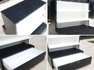 Wooden product shelf, 2 sides, 3 shelves on each side, 1 drawer, black wood frame with triangular pattern._52XAM9MFQT