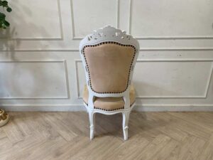 Single-seat Louis-style wooden chair with yellow button-tufted fabric upholstery.