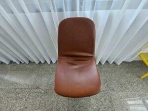Brown leather-upholstered dining chair with wooden legs (2)