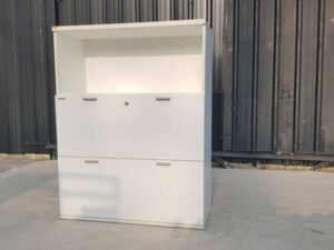 Moflex brand white 2-drawer filing cabinet with 1 storage compartment.