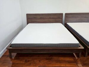 Brown solid wood bed (5-foot size) and white 5-foot mattress (IKEA Morgedal model)