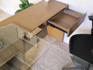 L-Shape corner work desk, glass top, foldable table. Has drawers and storage compartments._6IWKOCL622
