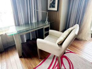 L-Shape corner work desk, glass top, foldable table. Has drawers and storage compartments._6IWKOCL622
