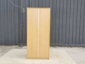 Wooden filing cabinet with 2 sliding doors and 3 shelves