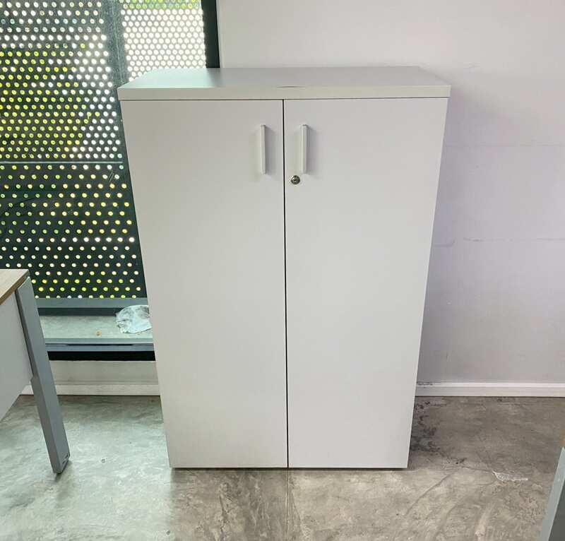 Tall filing cabinet with 2 doors, gray color.