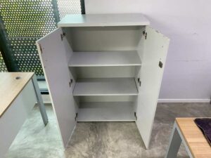 Tall filing cabinet with 2 doors, gray color.