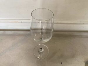 Clear wine glass with a long stem, IKEA brand, Storsint model.