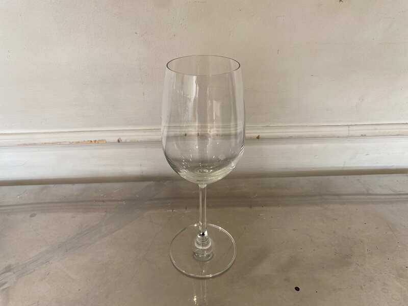 Clear wine glass with a long stem, IKEA brand, Storsint model.