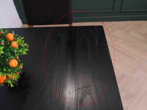 Table with black wood top, black steel legs, table top carved with gold stainless steel pattern._7MOYMHFGPW