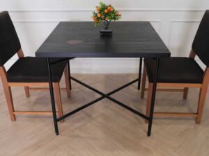 Table with black wood top, black steel legs, table top carved with gold stainless steel pattern._7MOYMHFGPW