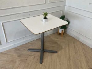 White wooden table, gray steel legs