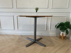 White wooden table, gray steel legs