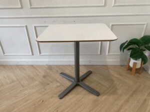 White wooden table, gray steel legs