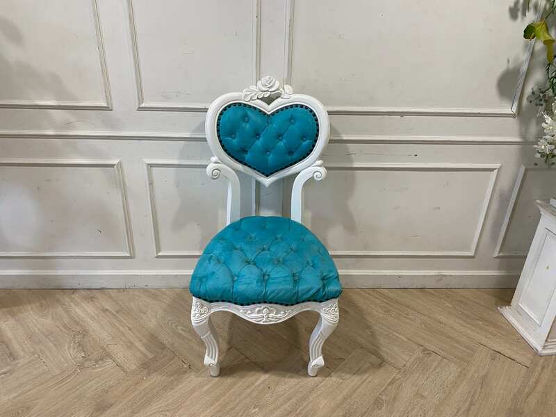 Single-seat Louis-style wooden chair with blue button-tufted fabric upholstery.