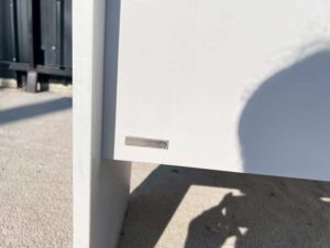 White desk with wooden top, Modernform brand.