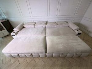 4-seater sofa bed with cream velvet upholstery. (1)