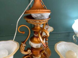 Chandelier, glass pendant lamp, floral pattern, brown and white color.