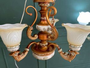 Chandelier, glass pendant lamp, floral pattern, brown and white color.